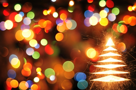 christmas tree from the color lights as nice xmas backgroundの写真素材