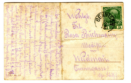 old used postcard isolated on the white backgroundのeditorial素材