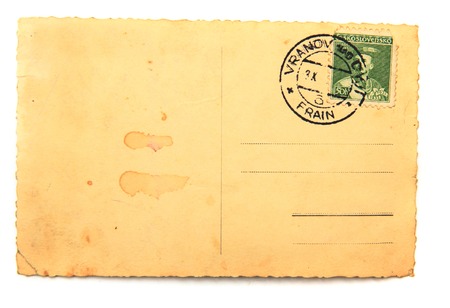 old empty postcard isolated on the white のeditorial素材