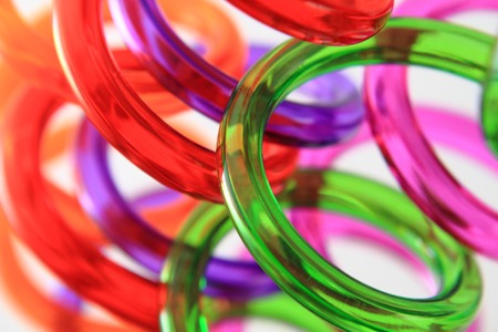 spiral color plastic straws isolated on white の写真素材