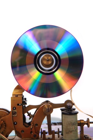 old telegraph with CD or DVD isolated on the white の写真素材