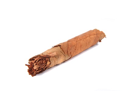old brown cigar isolated on the white backgroundの写真素材
