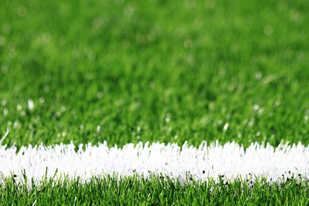 detail of plastic soccer grass as nice sport backgroundの写真素材