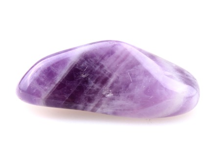 small violet amethyst isolated on the white background