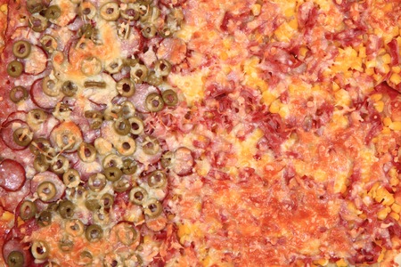 homemade pizza texture as gourmet food backgroundの写真素材