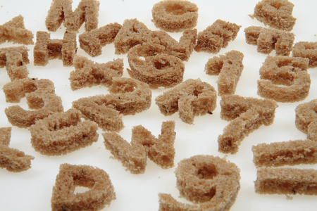bread alphabet isolated on the white backgroundの写真素材