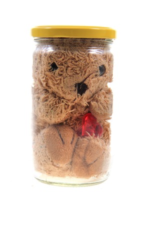 instant valentine toy in the glass bottle isolated on the white backgroundの写真素材