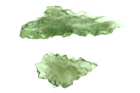 green moldavite minerals isolated on the white backgroundの写真素材