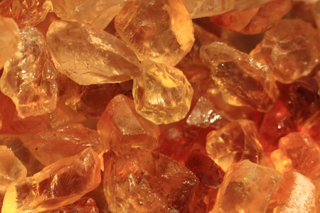 yellow citrin minerals texture as natural backgroundの写真素材