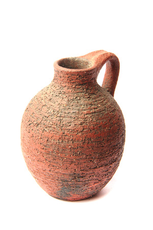 old jug isolated on the white backgroundの写真素材