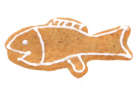 christmas fish gingerbread isolated on the white backgroundの写真素材