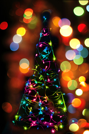 christmas tree from the color xmas lights as holiday backgroundの写真素材