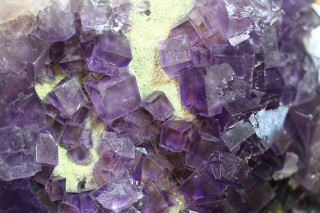 violet fluorite cubes as natural mineral backgroundの写真素材