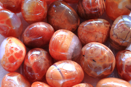 red fire agate minerals as nice natural backgroundの写真素材