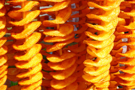 homemade fried potatoes chips as nice food backgroundの写真素材