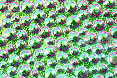 abstract water rainbow drops on the glass as background