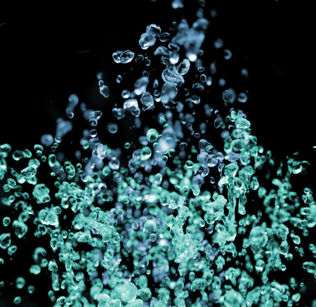 color water drops isolated on the black backgroundの写真素材