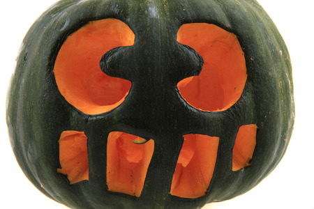 green halloween pumpkin isolated on the white backgroundの写真素材