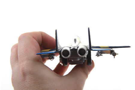 air fighter toy in human head isolated on the white background
