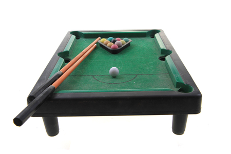 old billiard toy table isolated on the white background