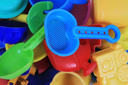 plastic sand toys as nice color backgroundの写真素材