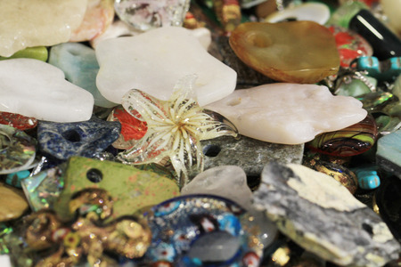 different plastic and glass gems collection as nice backgroundの写真素材