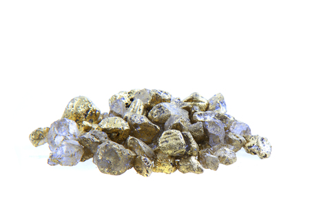 golden decoration stones isolated on the white backgroundの写真素材