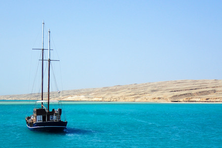 old yacht boat on the blue sea