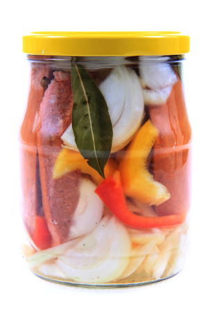 czech pickled sausages with onion and vinegar isolated on the white backgroundの写真素材