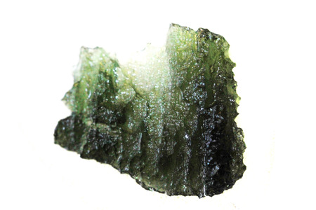 czech moldavite mineral isolated on the white backgroundの写真素材