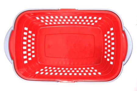 red empty plastic basket isolated on the white backgroundの写真素材