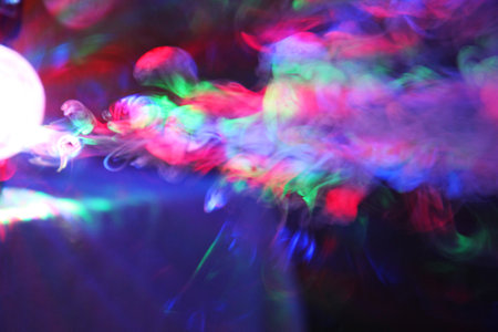color laser lights in the fog as nice abstract background