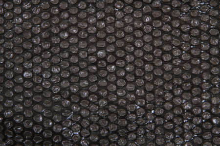 black bubble wrap texture as very nice backgroundの写真素材