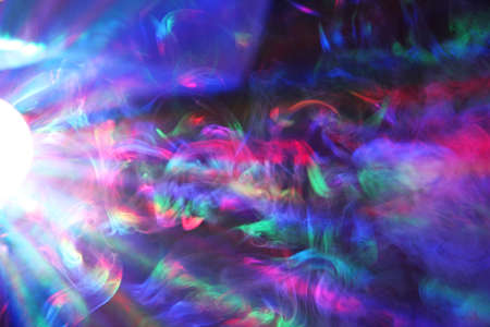 color laser lights in the fog as nice abstract backgroundの写真素材