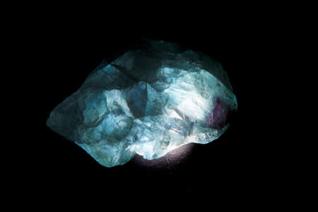 fluorite mineral isolated on the black backgroundの写真素材