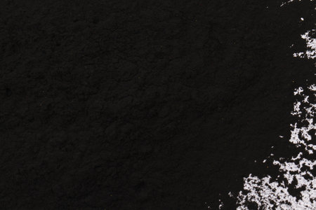 black laser powder isolated on the white backgroundの写真素材