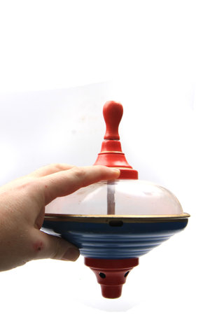 old humming top isolated on the white background