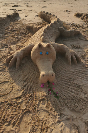 crocodile made from sand on the makadi bayの写真素材