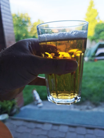 Czech beer in the spring garden in the eveningの写真素材