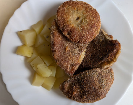 fried parasol mushrooms as schnitzel as traditional foodの写真素材