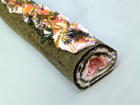 green spinach roll with ham and salmonの写真素材
