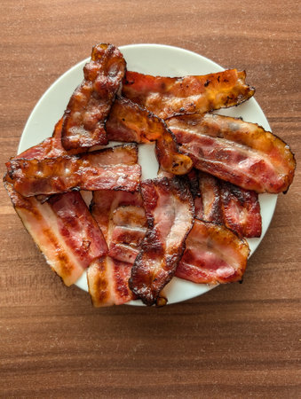 fresh fried bacon as great food backgroundの写真素材
