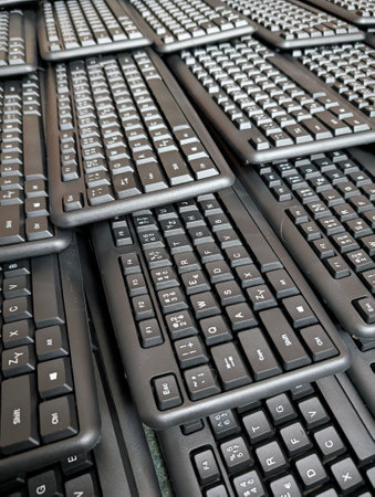 many black keyboards as very technological backgroundの写真素材
