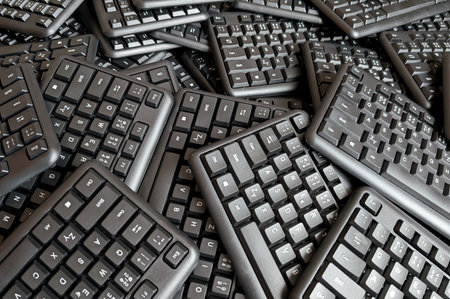 many black keyboards as very technological nice backgroundの写真素材