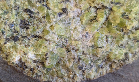 detail of natural olivine mineral as nice backgroundの写真素材