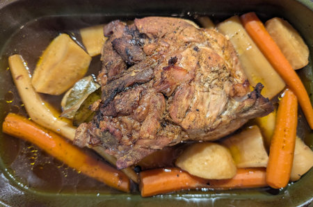 baked meat with vegetables as nice food backgroundの写真素材