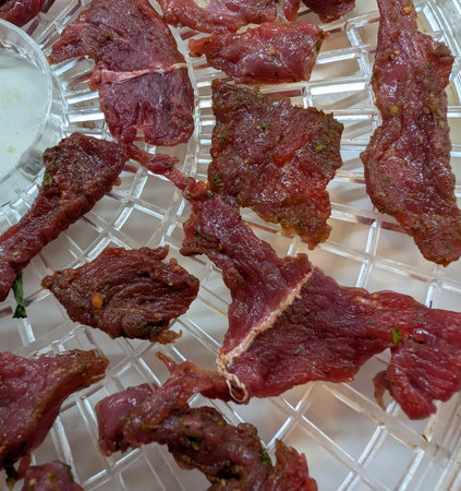making dried meat "Jerky" at home as nice backgroundの写真素材