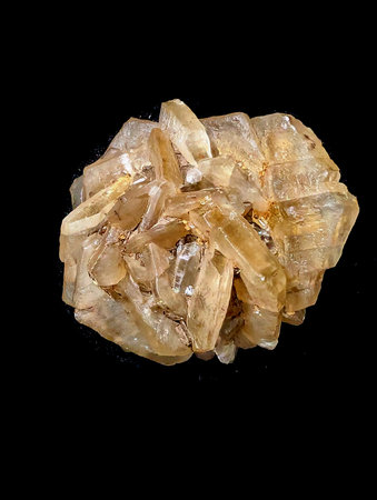gypsum mineral crystal isolated on the black backgroundの写真素材