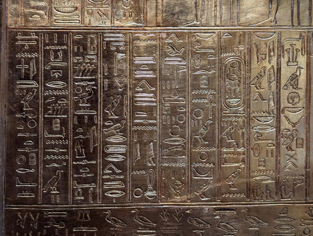 golden egyptian hieroglyphics as nice history textureの写真素材