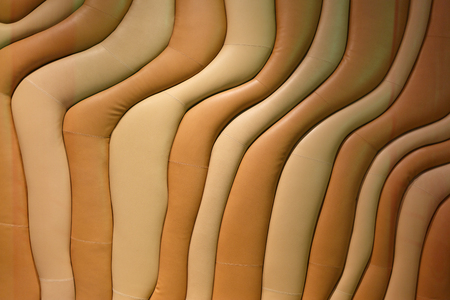 Leather, stitched, wavy texture. Brown and beige Horizontally framed shotの写真素材